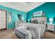 Relaxing bedroom with teal walls and plenty of natural light at 4135 N 17Th St # 8, Phoenix, AZ 85016