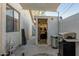Backyard with storage shed, grill, and shaded patio area at 4135 N 17Th St # 8, Phoenix, AZ 85016