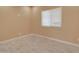 Simple bedroom with tile flooring and window with blinds at 4145 N Del Monte Dr, Eloy, AZ 85131