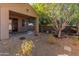 Landscaped backyard with patio and gravel at 4202 E Broadway Rd # 52, Mesa, AZ 85206