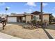 Ranch style home with a two-car garage and well-maintained landscaping at 4641 W Palo Verde Ave, Glendale, AZ 85302