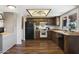 Efficient kitchen featuring wood cabinets and a built-in microwave at 4641 W Palo Verde Ave, Glendale, AZ 85302