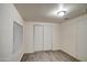 Bright bedroom with tile floors and double-door closet at 517 W 11Th St, Casa Grande, AZ 85122