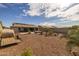 Spacious backyard with gravel landscaping and storage at 5508 N 190Th Dr, Litchfield Park, AZ 85340