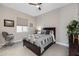 Cozy bedroom with a double bed and plenty of natural light at 5508 N 190Th Dr, Litchfield Park, AZ 85340