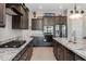 Modern kitchen with granite countertops and stainless steel appliances at 5508 N 190Th Dr, Litchfield Park, AZ 85340
