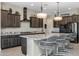 Modern kitchen with granite countertops and stainless steel appliances at 5508 N 190Th Dr, Litchfield Park, AZ 85340