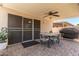 Covered patio with seating area, ceiling fan, and grill at 62 W Melody Dr, Gilbert, AZ 85233