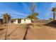 Large backyard with a spacious area and a view of the house at 633 W 1St St, Mesa, AZ 85201