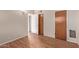 Bedroom with wood-look floors and doors at 633 W 1St St, Mesa, AZ 85201