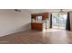 Kitchen features wood cabinets and a breakfast bar at 633 W 1St St, Mesa, AZ 85201
