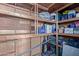 Well-organized storage shed with shelves for various items at 633 W 1St St, Mesa, AZ 85201