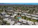 Aerial view of community, highlighting building rooftops and pool at 7153 N Via De Paesia --, Scottsdale, AZ 85258