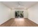 Bright bedroom with sliding door to private patio and ceiling fan at 7153 N Via De Paesia --, Scottsdale, AZ 85258