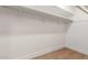 Large closet with wood shelving and hanging rod at 7153 N Via De Paesia --, Scottsdale, AZ 85258