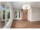 Dining area with hardwood floors and built-in wood cabinets at 7153 N Via De Paesia --, Scottsdale, AZ 85258