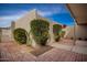 Private courtyard with brick walkways and shrubs at 7153 N Via De Paesia --, Scottsdale, AZ 85258