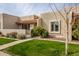 Attractive tan stucco exterior with well-maintained landscaping and a paved walkway at 7153 N Via De Paesia --, Scottsdale, AZ 85258