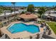 Community pool and recreation area with lounge chairs at 7153 N Via De Paesia --, Scottsdale, AZ 85258