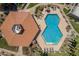 Community pool and recreation area with adjacent covered pavilion at 7153 N Via De Paesia --, Scottsdale, AZ 85258