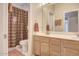 Clean bathroom with double sinks and shower/tub combo at 7278 W Via Montoya Dr, Glendale, AZ 85310