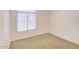 Simple bedroom with neutral decor and ample space at 7278 W Via Montoya Dr, Glendale, AZ 85310
