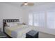 Spacious bedroom with a queen bed and large windows at 7278 W Via Montoya Dr, Glendale, AZ 85310