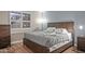 Bright bedroom featuring a wooden bed frame and grey bedding at 7625 E Camelback Rd # B148, Scottsdale, AZ 85251