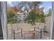 Private patio with seating for two and a small table at 7625 E Camelback Rd # B148, Scottsdale, AZ 85251