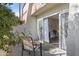 Private patio with seating and access to the interior at 7625 E Camelback Rd # B148, Scottsdale, AZ 85251