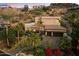 Hillside home with a three-car garage and desert landscaping at 7631 N 20Th St, Phoenix, AZ 85020