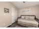 Small bedroom with daybed, closet, and neutral decor at 9333 E University Dr # 110, Mesa, AZ 85207