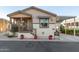 House exterior with a porch, steps, and landscaping at 9333 E University Dr # 110, Mesa, AZ 85207