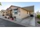 House exterior showcasing a carport and porch at 9333 E University Dr # 110, Mesa, AZ 85207