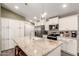 Bright kitchen boasts granite countertops and ample cabinetry at 9333 E University Dr # 110, Mesa, AZ 85207