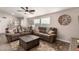 Relaxing living room with brown sectional sofa and coffee table at 9333 E University Dr # 110, Mesa, AZ 85207