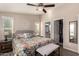 Large main bedroom with ceiling fan, walk-in closet, and ensuite bathroom at 9333 E University Dr # 110, Mesa, AZ 85207