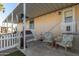 Relaxing patio with seating, heater, and fenced area at 9333 E University Dr # 110, Mesa, AZ 85207