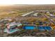 Aerial view of community amenities including pool, tennis courts, and clubhouse at 9574 E Chuckwagon Ln, Scottsdale, AZ 85262