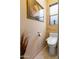 Small bathroom with modern toilet and decorative wall at 9574 E Chuckwagon Ln, Scottsdale, AZ 85262