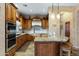 Gourmet kitchen boasts granite countertops and custom cabinetry at 9574 E Chuckwagon Ln, Scottsdale, AZ 85262