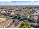 Wide aerial view of the property and surrounding neighborhood at 9839 E Theia Dr, Mesa, AZ 85212