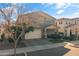 Two-story home with neutral exterior, two-car garage, and landscaping at 9839 E Theia Dr, Mesa, AZ 85212