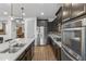 Modern kitchen features stainless steel appliances and ample counter space at 9839 E Theia Dr, Mesa, AZ 85212