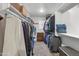 Large walk-in closet with ample shelving and hanging space at 9839 E Theia Dr, Mesa, AZ 85212