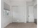 Bedroom with sliding closet doors and neutral decor at 10032 E Toledo Ave, Mesa, AZ 85212