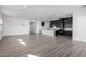 Modern kitchen with dark cabinetry, white subway tile and island at 10032 E Toledo Ave, Mesa, AZ 85212