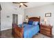 Bedroom with wooden furniture at 10869 W Alex Ave, Sun City, AZ 85373