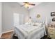 Bedroom with white picket headboard at 10869 W Alex Ave, Sun City, AZ 85373