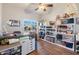 Home office with built-in shelving at 10869 W Alex Ave, Sun City, AZ 85373